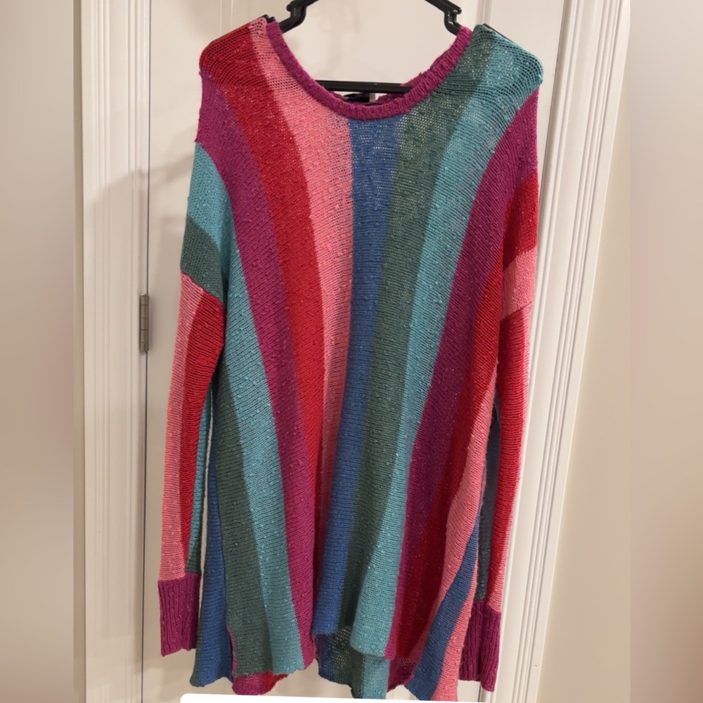 Show Me Your MuMu Striped swimsuit coverup.